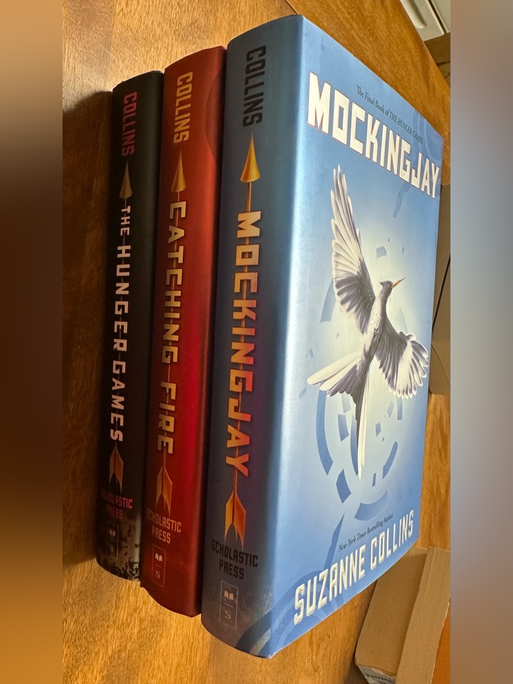The Hunger Games, Catching Fire, and Mockingjay Novels By Suzanne Collins - Picture 6 of 8